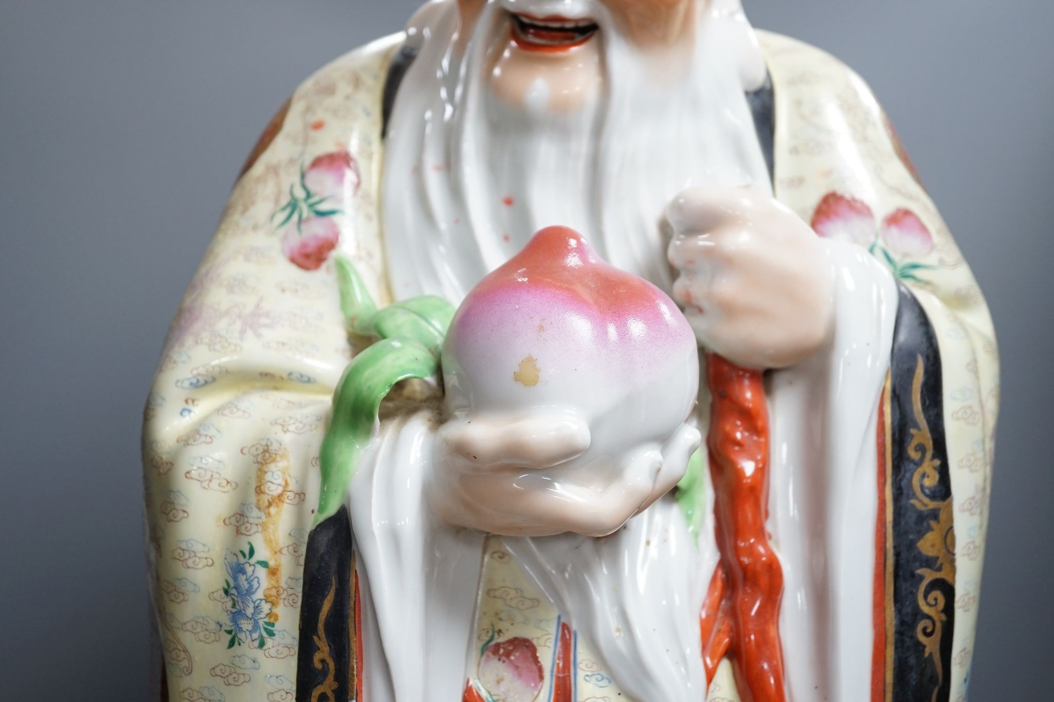 A large early 20th century Chinese porcelain figure of Shou Lao, 67cm